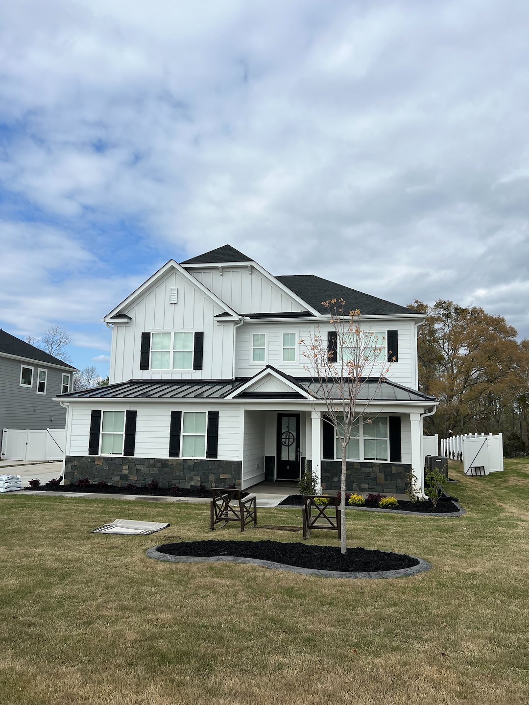 Exterior House Washing with Red Clay Stain Removal & Concrete Cleaning Project in Simpsonville, SC